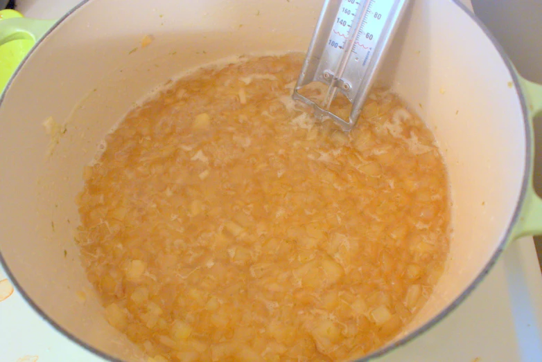 a bowl filled with brown cereal sits on a table