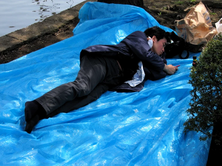 a man lies on an inflatable floating body