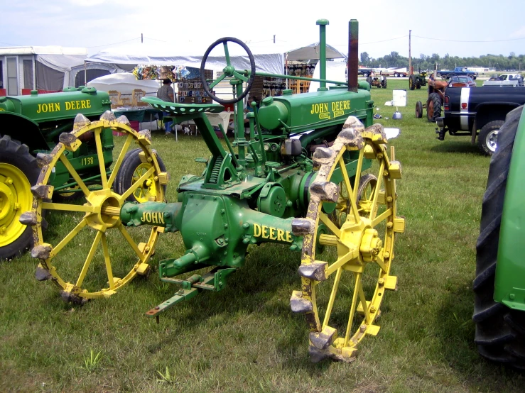 a tractor parked in a field of grass