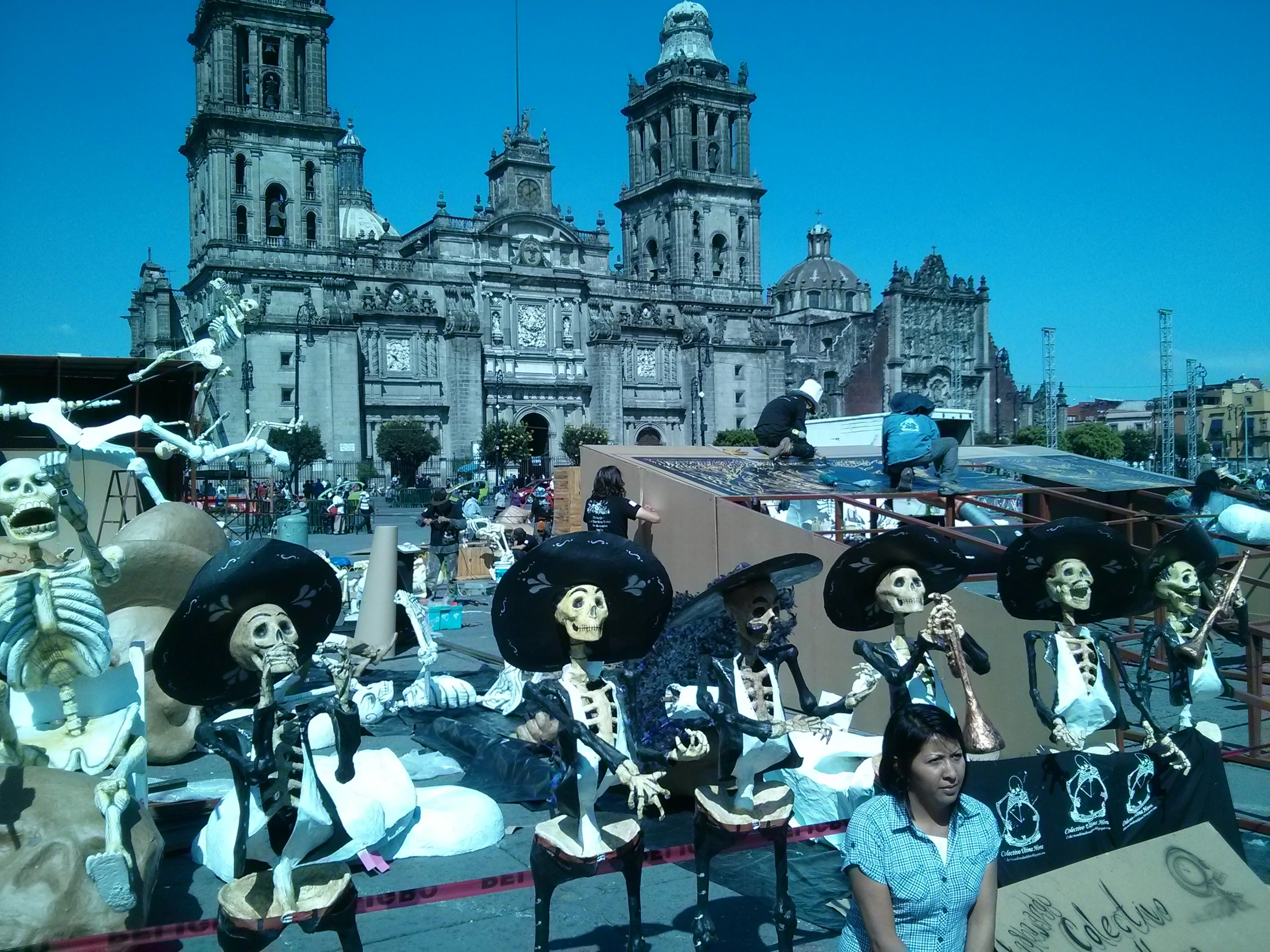 this is a po of a carnival with fake skeletons in the background