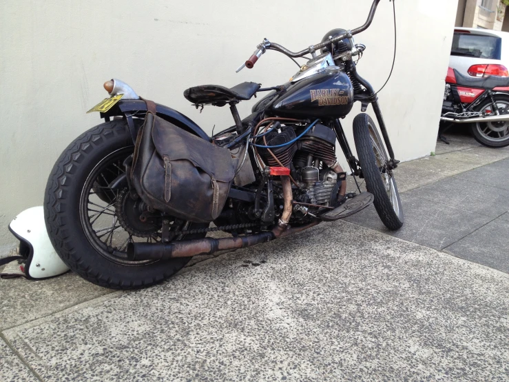 a close up of a motorcycle parked on the street