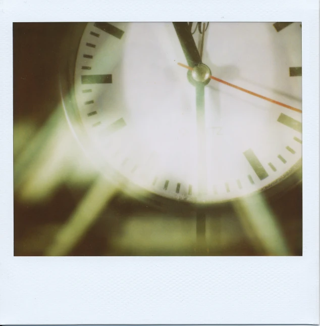 a clock with a blurry view of it