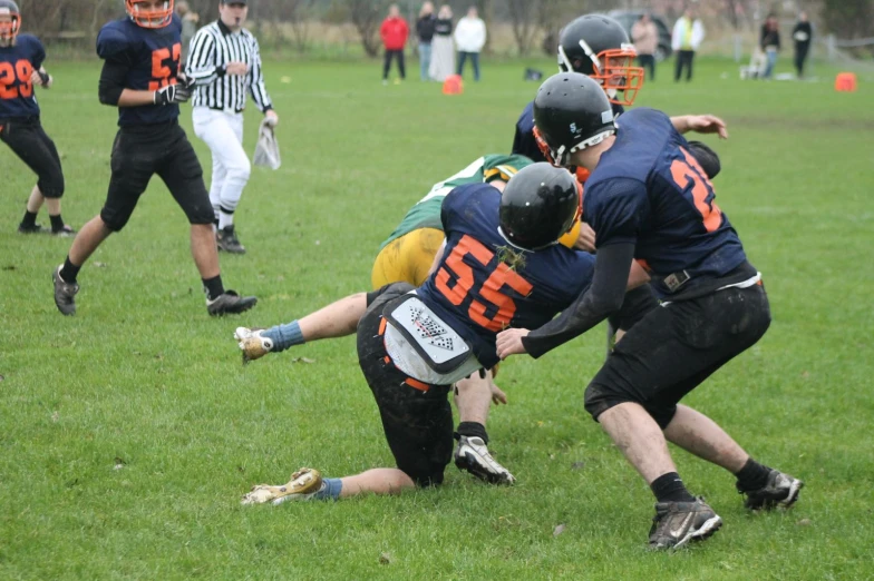 a group of men playing a game of football