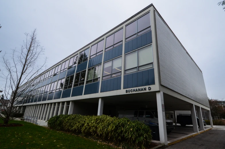 the building has several windows on the top floor