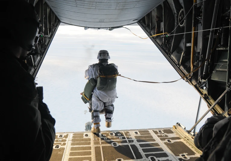 a man flying through the air from an aircraft