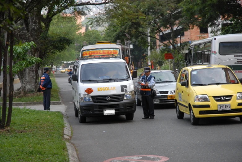 a couple of cars that are on the road