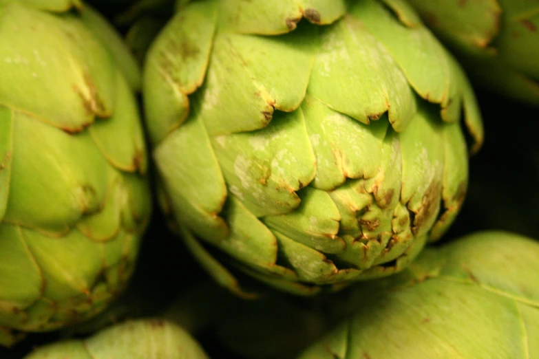 artichokes sitting in the center of a bunch