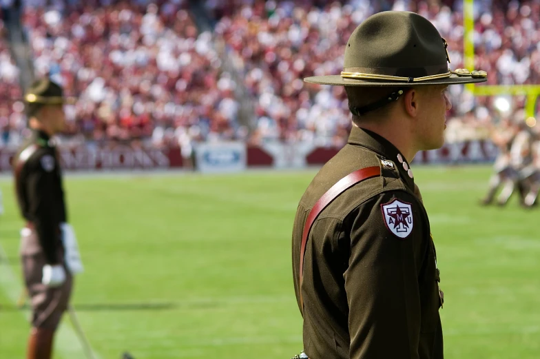 a man in an army uniform on the field