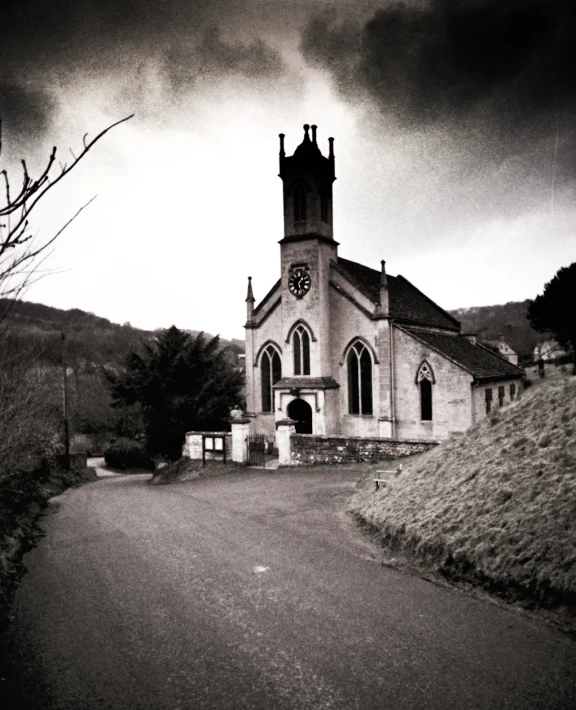 a church in a small village sits near the roadside
