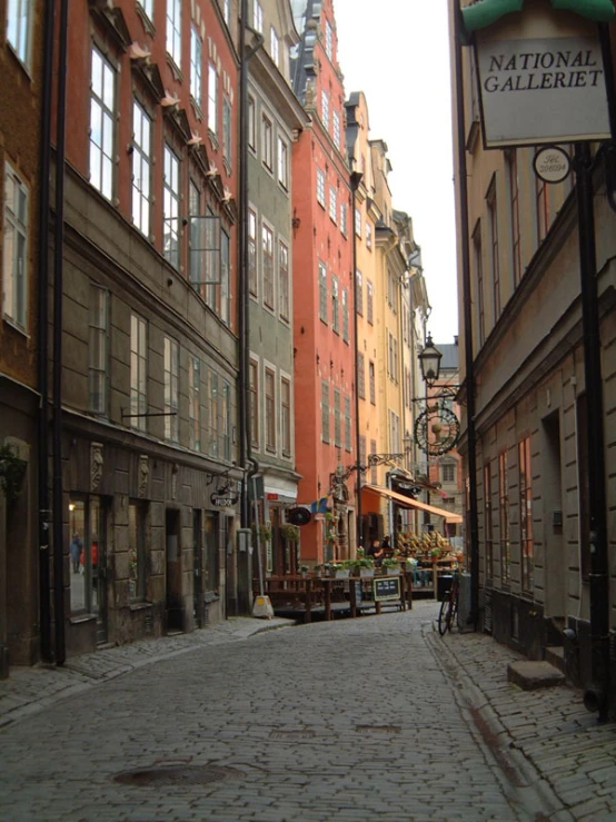narrow cobblestone street in a historic city