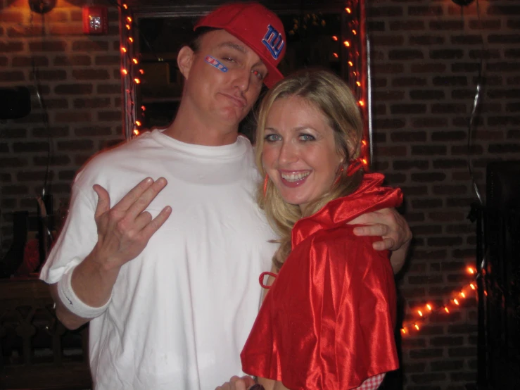 a couple in costume posing for the camera