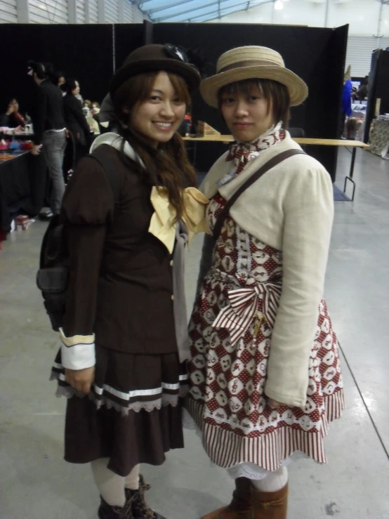 a couple of young people that are dressed in costumes