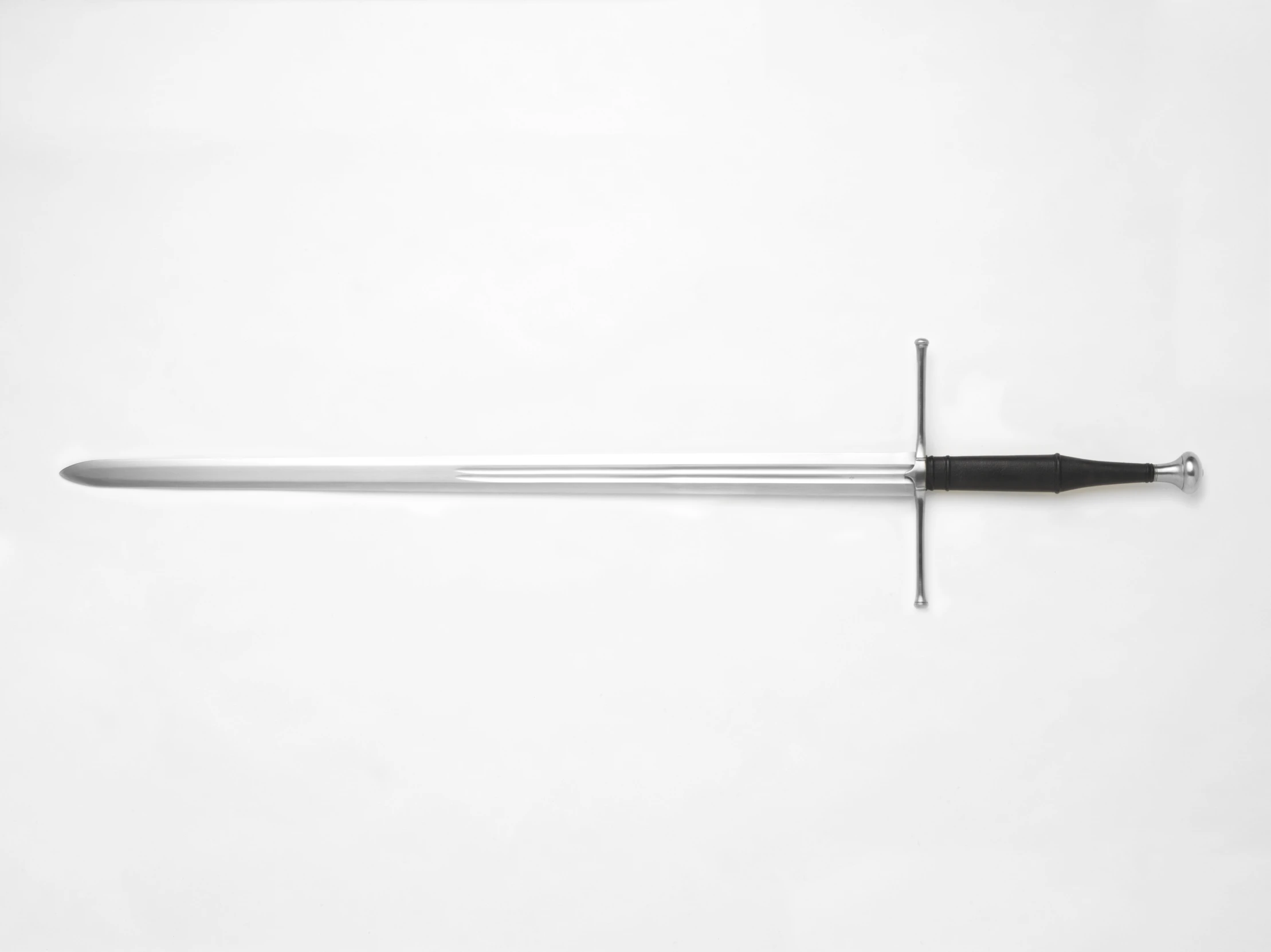 the sword has a black handle and is held on a metal bar