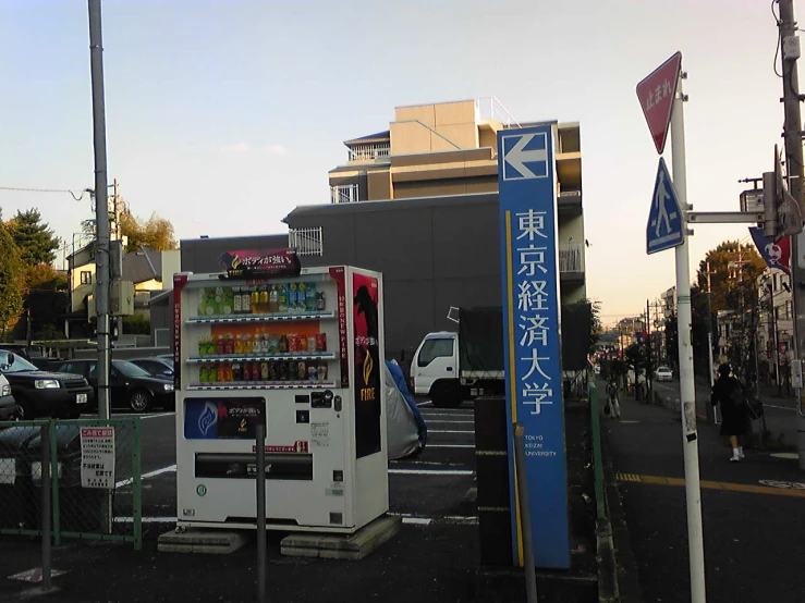 an oriental beverage kiosk in a city area