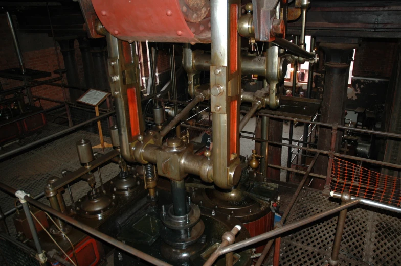a steam engine has its pipes and valves running
