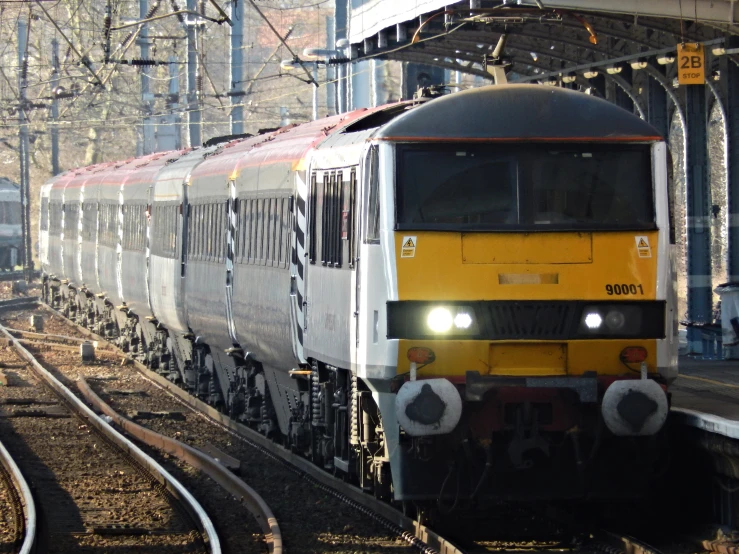 a train on the tracks with several tracks near by