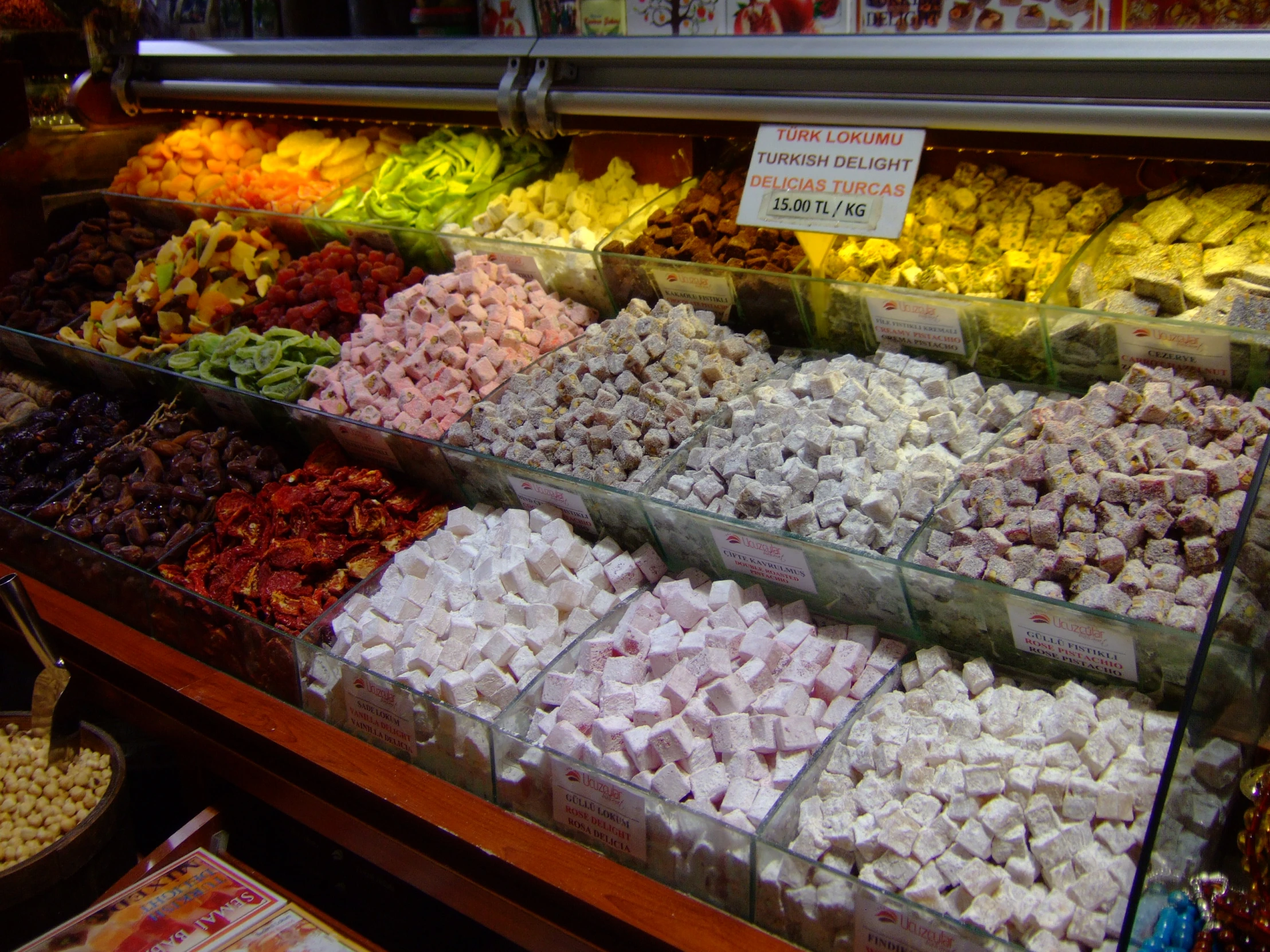 a variety of sweets sitting in a store