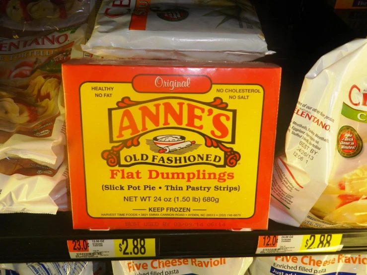 a display at a store featuring old fashioned flat dumplings and ann's cheese