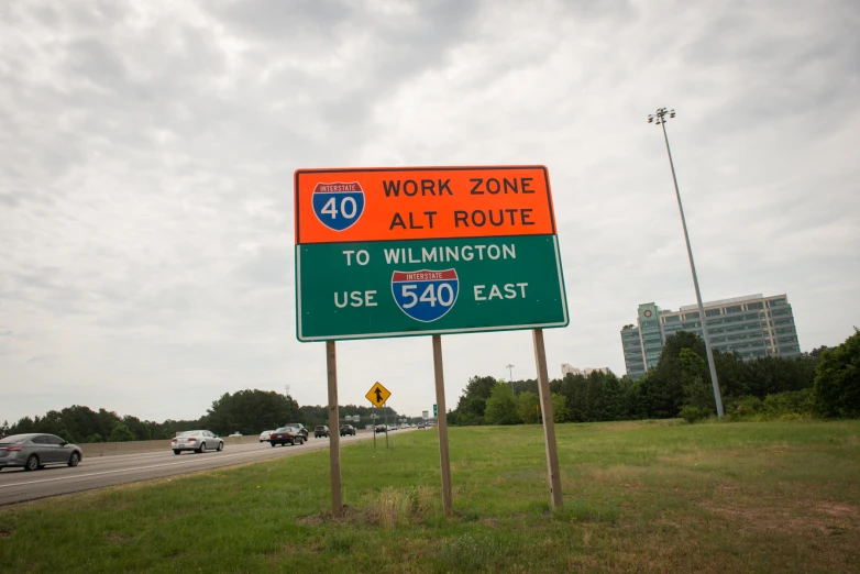 a highway sign warning about the work zone