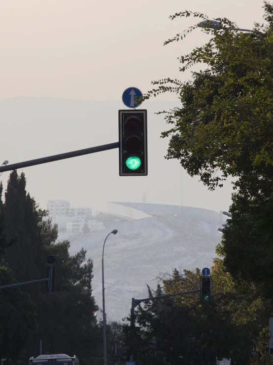 an intersection is shown with a green traffic light