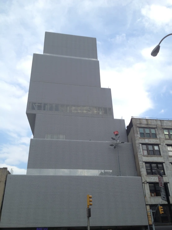 a tall building sitting next to a traffic light