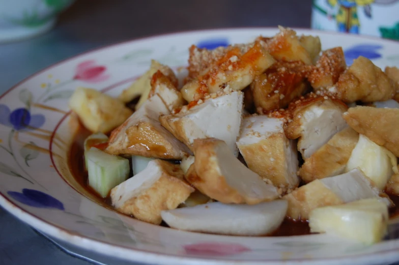 this meal consists of pork and fried vegetables