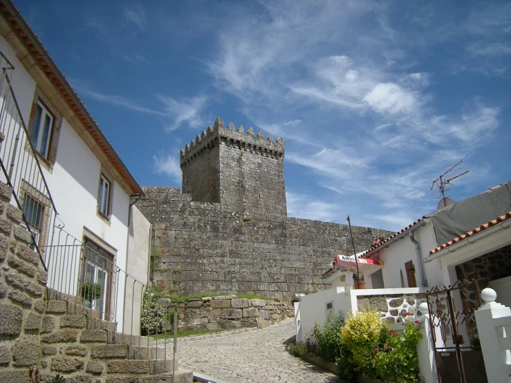 some buildings are close to each other in a courtyard