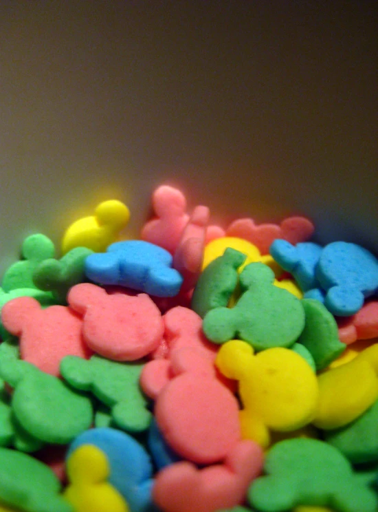 many different candies are shown on a tray