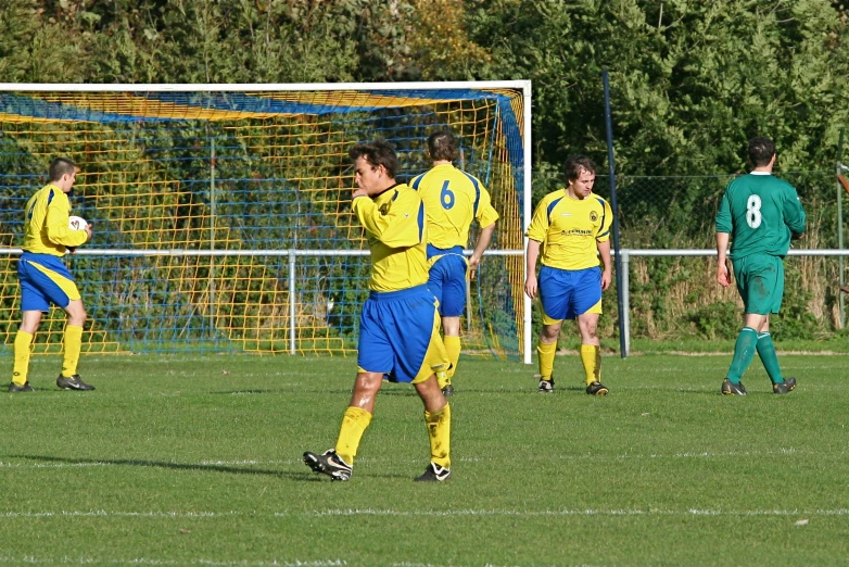 soccer players on the field playing soccer