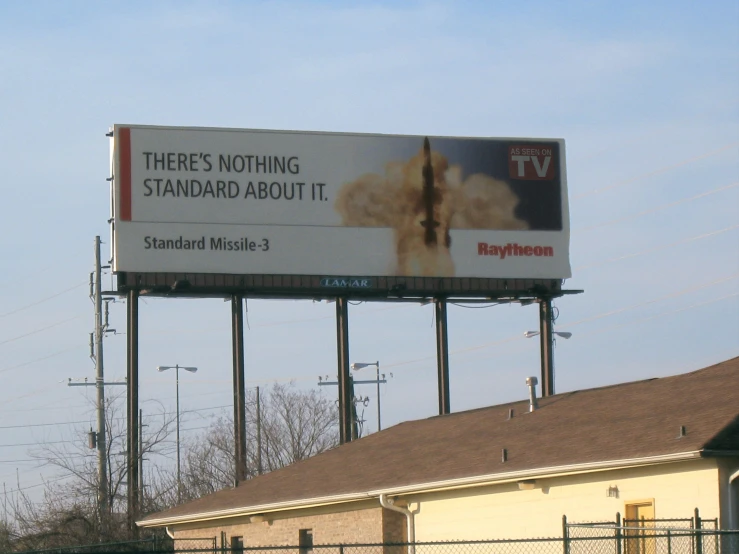 an billboard with a giant religious image in the sky