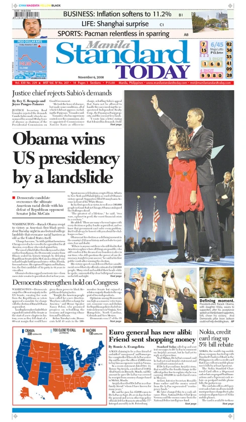 a newspaper clipping with obama and biden's news