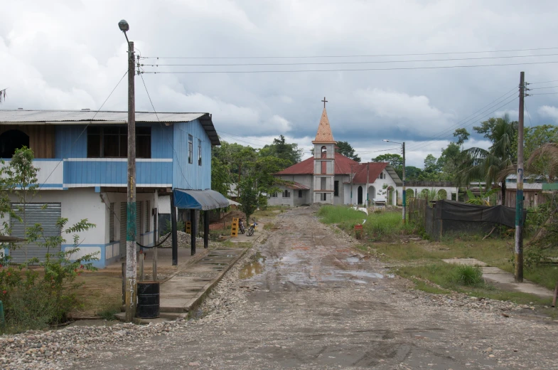 a small road with buildings on both sides