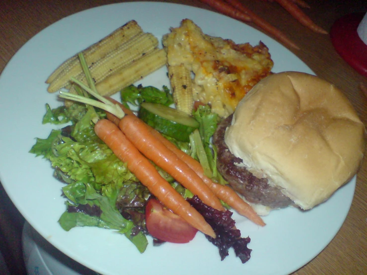 the meal is sitting on the plate with vegetables