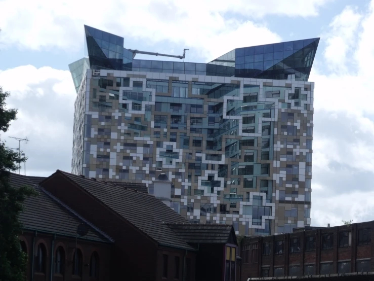 a modern building with lots of windows on top