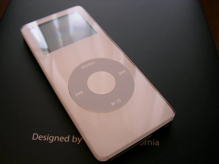 an ipod that is laying on a table