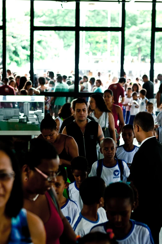 a group of people in a crowd with many dressed up