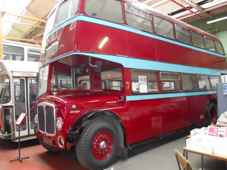 the two story bus is in the shop