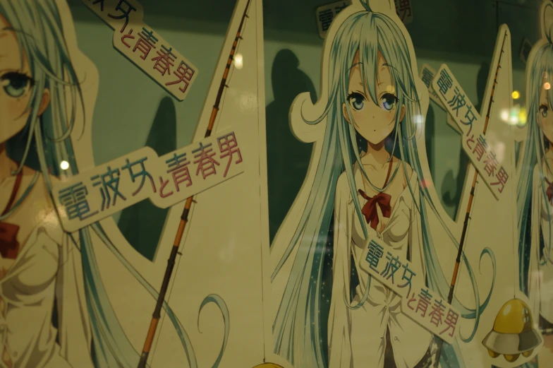 an anime wall has many signs attached to it