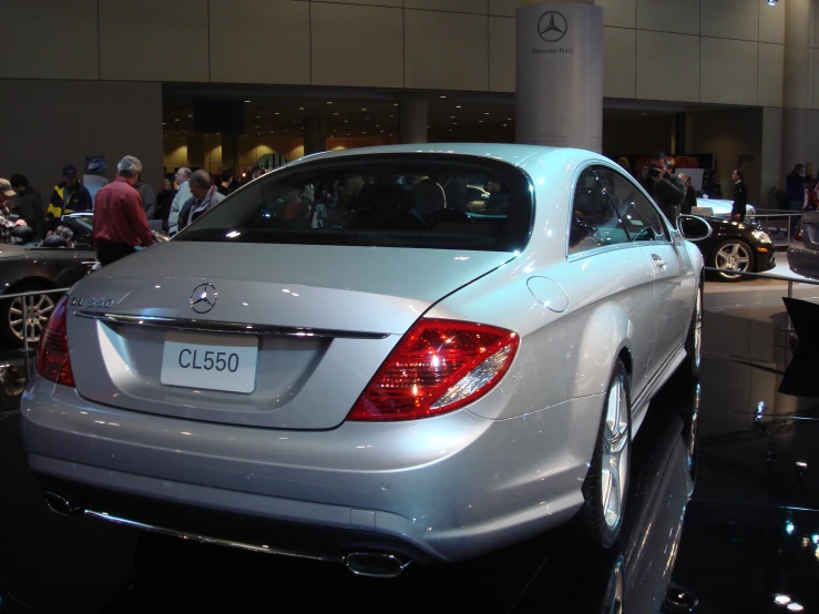 a mercedes cla parked inside a building