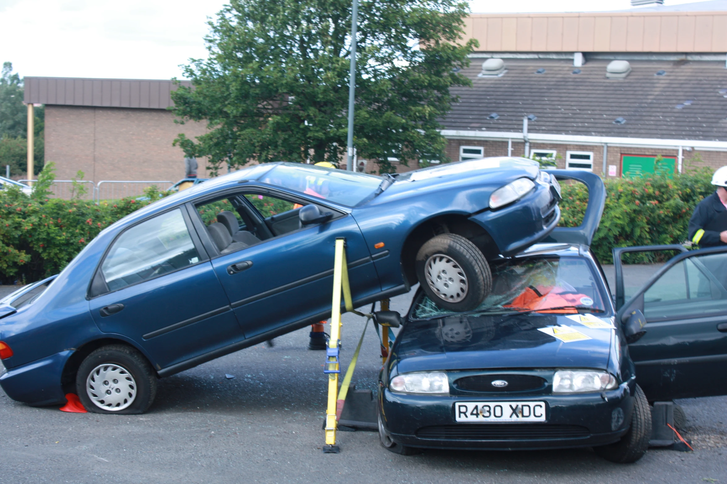 a couple of cars are parked in the lot