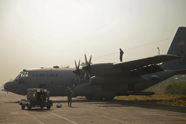 a man stands on the air force plane