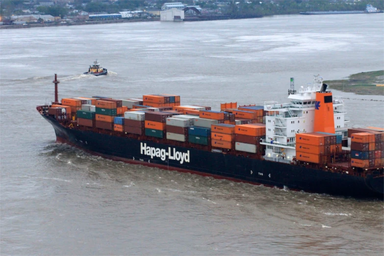 a large boat with a lot of containers on it