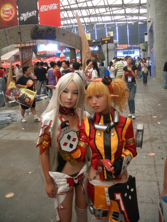 two women dressed as some kind of anime character in the same outfit