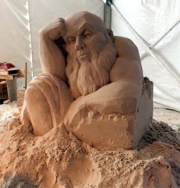 a sand sculpture is in the process of being made