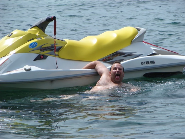 a man is taking a ride on a jet ski