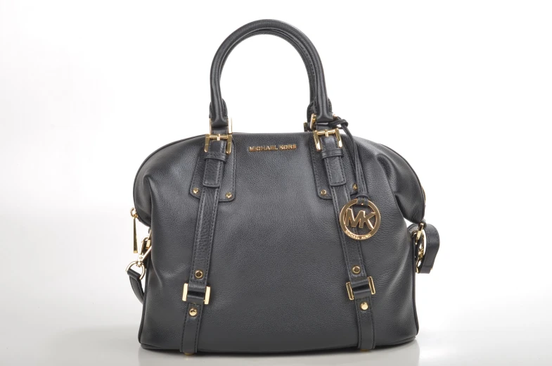 the large gray handbag has a golden metal handles