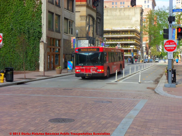 a bus stopped at a light on a city street