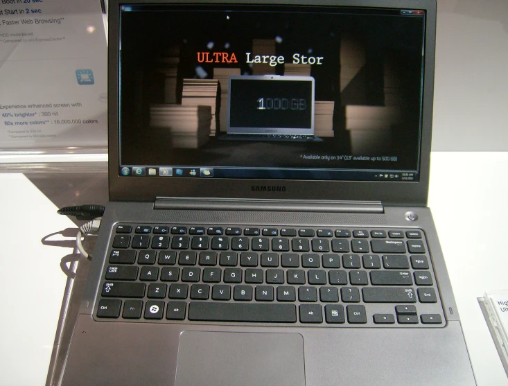 a close up of a laptop with a large screen