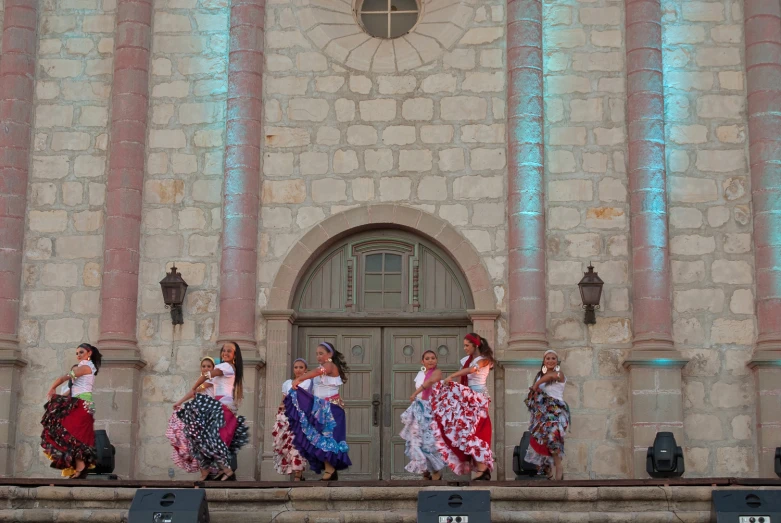 group of girls walking down steps from a building