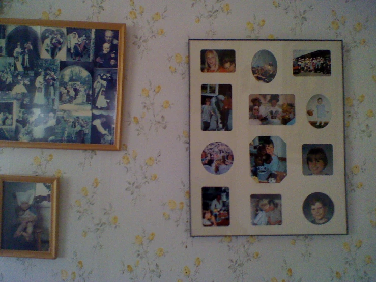 two pictures and many pos hung on the wall